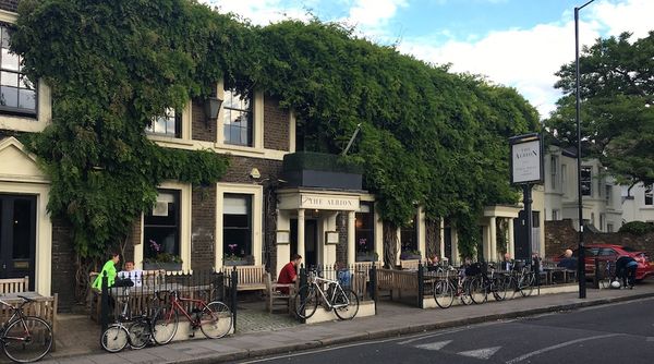 The Albion on Thornhill Road with lots of cycles attached to their railings.